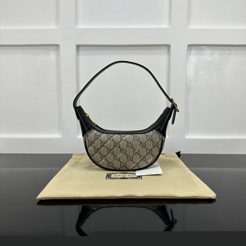 G*u*i top handle bags
